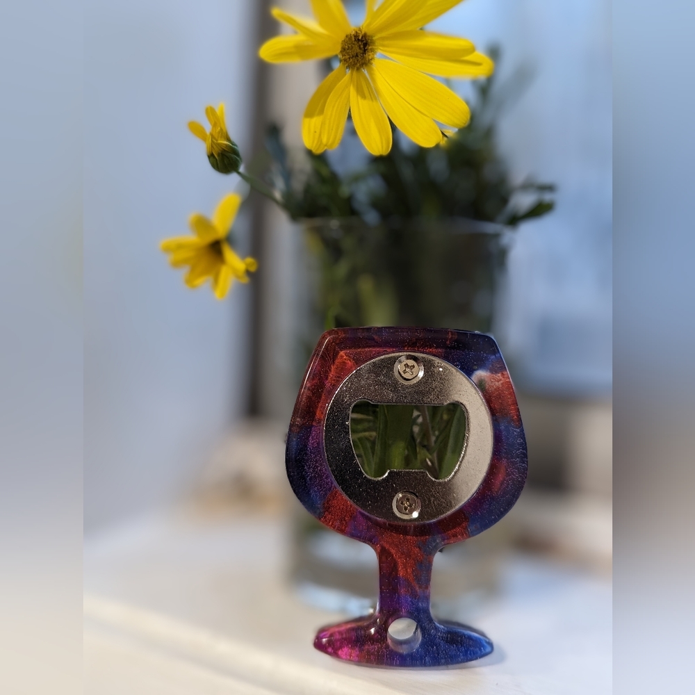Hand crafted resin bottle opener. Red,blue, purple, rose gold metallic.